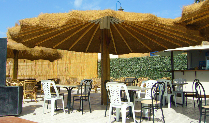 Straw roofs for beach umbrellas